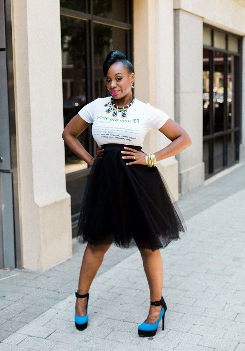 Khalilah Jones, Chic and Classy Image Consulting Khalilah Jones in a white entrepreneHER and black skirt.